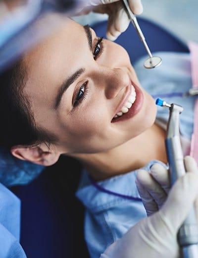 Woman receiving a teeth cleaning