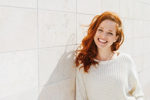 Woman smiling outside