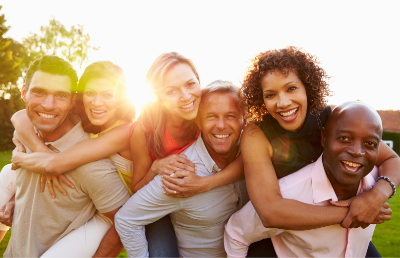 group of people smiling and laughing