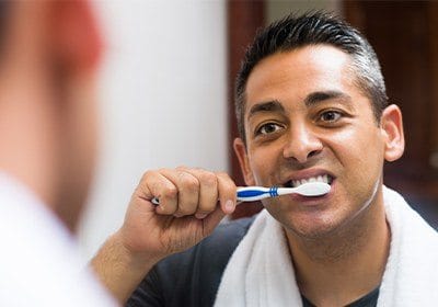 Man brushing his teeth