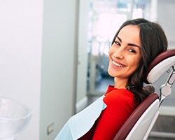 woman smiling during her dental visit