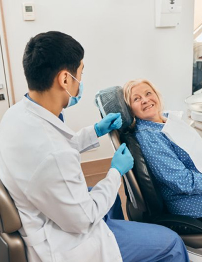 Dentist and patient talking during consultation