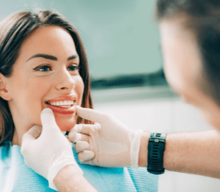 Woman receiving dental exam