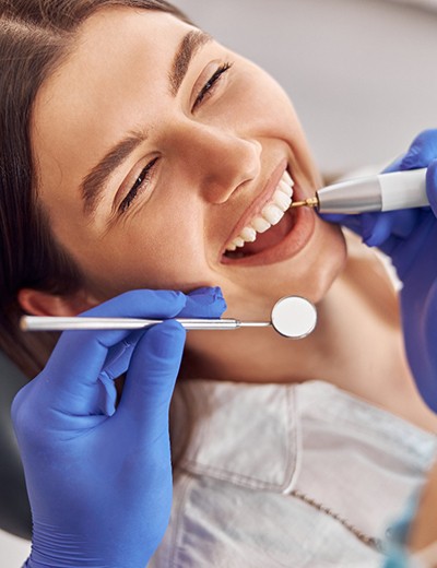Woman smiling in the dental chair