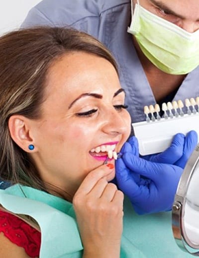 woman picking out veneers