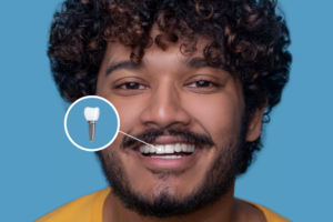 a smiling patient with a dental implant 